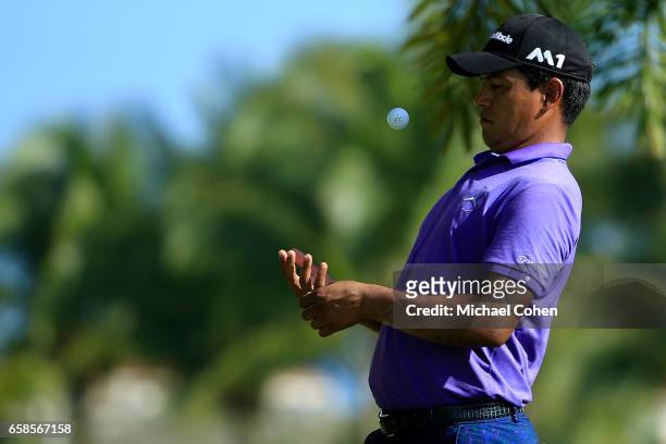 Fabian Gomez of Argentina tosses his golf ball on the second tee box during the final round of the Puerto Rico Open at Coco Beach on March 26, 2017...