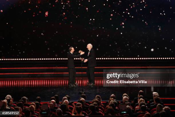 Roberto Benigni receives the Lifetime Achievement Award from Giuliano Montaldo during the 61. David Di Donatello ceremony on March 27, 2017 in Rome,...