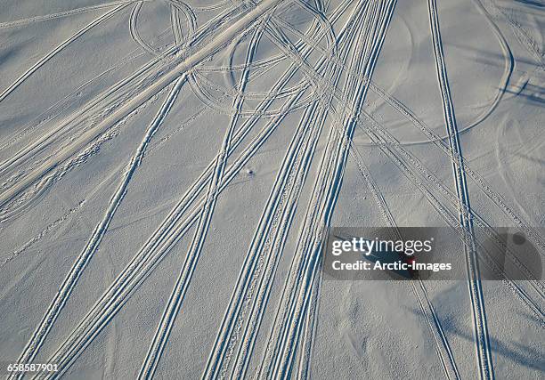 top view of snowmobile and tracks, lapland, sweden - sweden lapland stock pictures, royalty-free photos & images