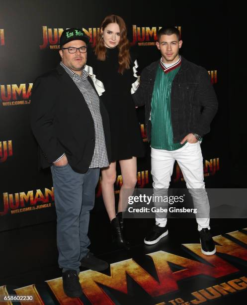 Actors Jack Black, Karen Gillan, and actor/singer Nick Jonas attend a photo call for Columbia Pictures' "Jumanji: Welcome to the Jungle" during...