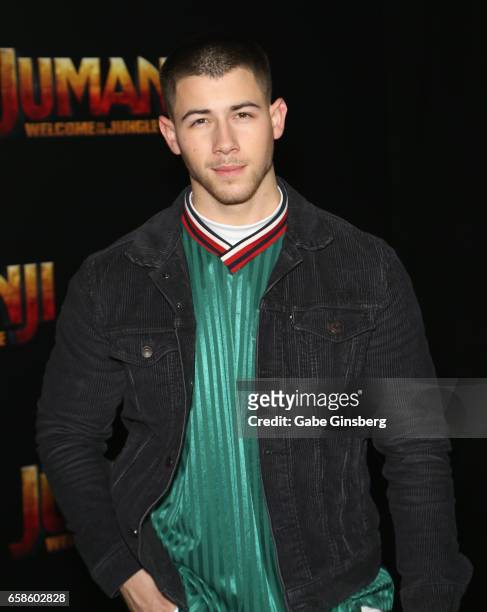Actor/singer Nick Jonas attends a photo call for Columbia Pictures' "Jumanji: Welcome to the Jungle" during CinemaCon at Caesars Palace on March 27,...