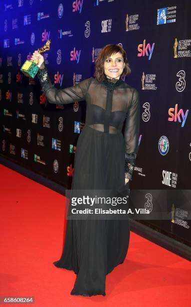 Actress Antonia Truppo poses with her Best Supporting Actress award at the end of the 61. David Di Donatello ceremony on March 27, 2017 in Rome,...