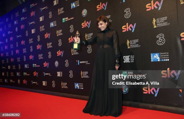 Actress Antonia Truppo poses with her Best Supporting Actress award at the end of the 61. David Di Donatello ceremony on March 27, 2017 in Rome,...