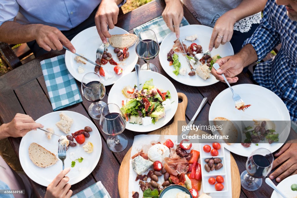 Friends eating together