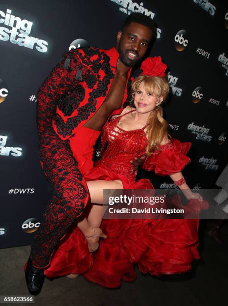 Dancer Keo Motsepe and pop music icon Charo attend "Dancing with the Stars" Season 24 at CBS Televison City on March 27, 2017 in Los Angeles,...