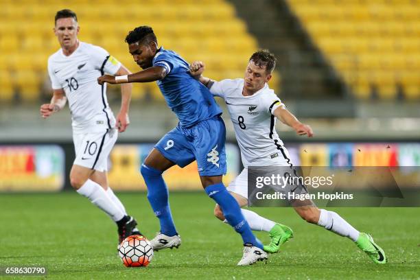 Roy Krishna of Fiji is tackled by Michael McGlinchey of New Zealand during the 2018 FIFA World Cup Qualifier match between the New Zealand All Whites...