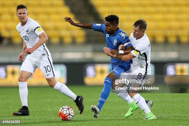 Roy Krishna of Fiji is tackled by Michael McGlinchey of New Zealand during the 2018 FIFA World Cup Qualifier match between the New Zealand All Whites...