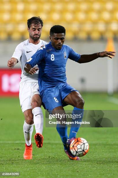 Setareki Hughes of Fiji holds off the challenge of Thomas Doyle of New Zealand during the 2018 FIFA World Cup Qualifier match between the New Zealand...