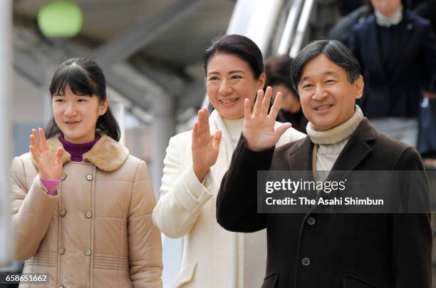 Crown Prince Naruhito , Crown Pricness Masako and their daughter Princess Aiko wave to well-wishers on arrival at Nagano Station on March 27, 2017 in...