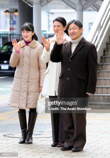 Crown Prince Naruhito , Crown Pricness Masako and their daughter Princess Aiko wave to well-wishers on arrival at Nagano Station on March 27, 2017 in...