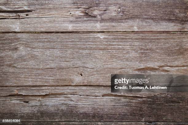 close-up of an old teak board wall texture background. - teak wood material photos et images de collection