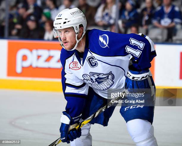 Erik Condra of the Syracuse Crunch prepares for a face-off against the Toronto Marlies during AHL game action on March 26, 2017 at Ricoh Coliseum in...