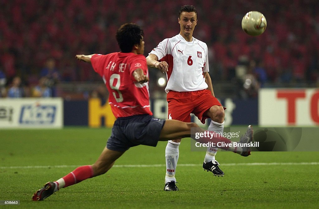 Hyeon Ki Seol of South Korea and Tomasz Hajto of Poland