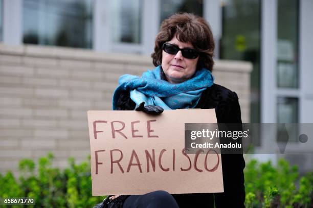 Woman holds a banner reading "Free Francisco" during a protest outside the Immigration and Customs Enforcement building in Portland, Oregon, United...