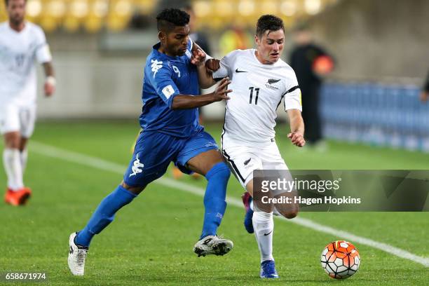 Marco Rojas of New Zealand is tackled by Roy Krishna of Fiji during the 2018 FIFA World Cup Qualifier match between the New Zealand All Whites and...