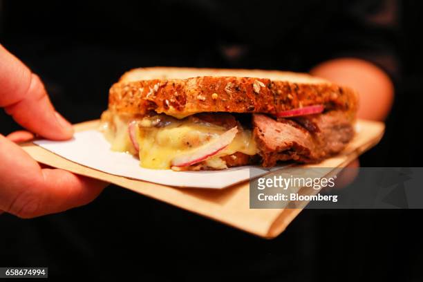 Barista prepares a toasted sandwich inside a branch of food retailer Pret a Manger Ltd. In London, U.K., on Monday, March 27, 2017. Food chain Pret a...