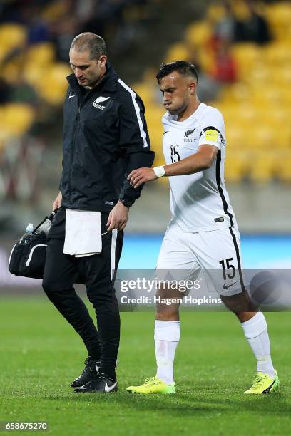 Clayton Lewis of New Zealand leaves the field with an injury during the 2018 FIFA World Cup Qualifier match between the New Zealand All Whites and...