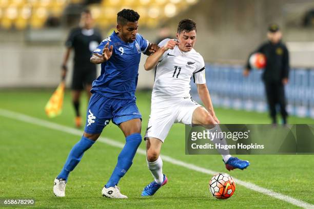 Marco Rojas of New Zealand is tackled by Roy Krishna of Fiji during the 2018 FIFA World Cup Qualifier match between the New Zealand All Whites and...