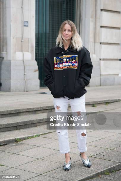 Fashion buyer for Browns Holli Rogers wears a Facetasm jacket, Rejina Pyo jeans and Celine shoes on day 3 of London Womens Fashion Week Autumn/Winter...