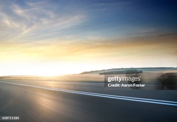 fast moving road in motion - road motion stock pictures, royalty-free photos & images