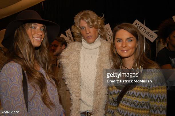 Jessica Miller, Mike and Anouck Lepere attend Michael Kors fashion show at at the tents on February 11, 2004 in New York City.