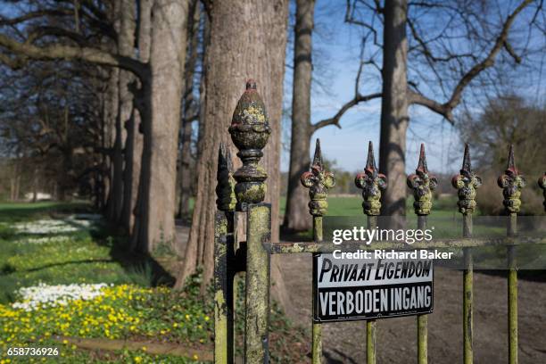 Old wrought iron gates and no entry sign at the entrance of the privately-owned de Merode Castle, out of bounds for locals, on 25th March, in...