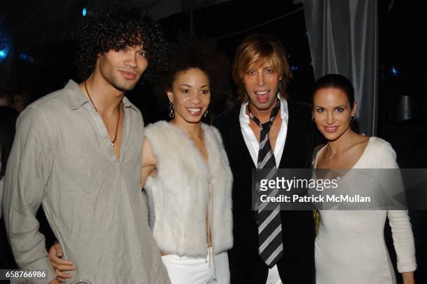 Jube, Cindy Blackman, Steven Cojacaru and Tia Texada attend Steven Cojacaru/Boss Models Party at Soho House on February 12, 2004 in New York City.