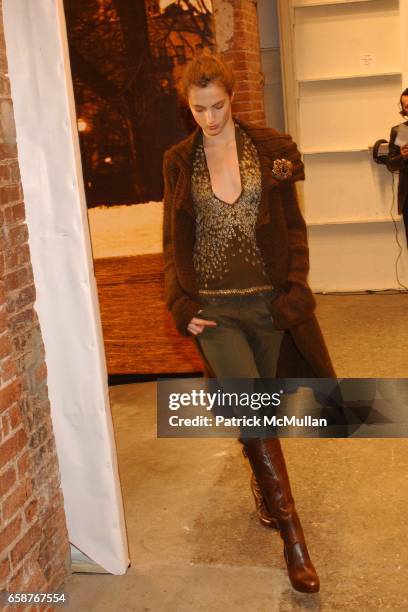 Jessica Miller attends at the DKNY Fashion Show at Eyebeam Atelier on February 9, 2004 in New York City.