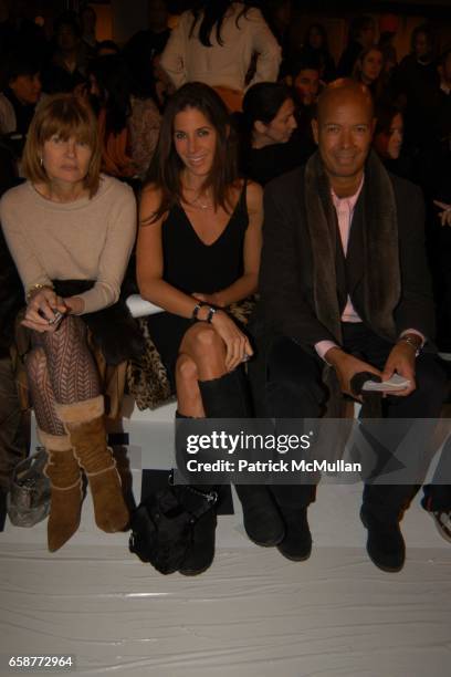 Ann McNally, Elizabeth Saltzman and Michael Roberts attend Calvin Klein Fashion Show at Milk Studios on February 12, 2004 in New York City.