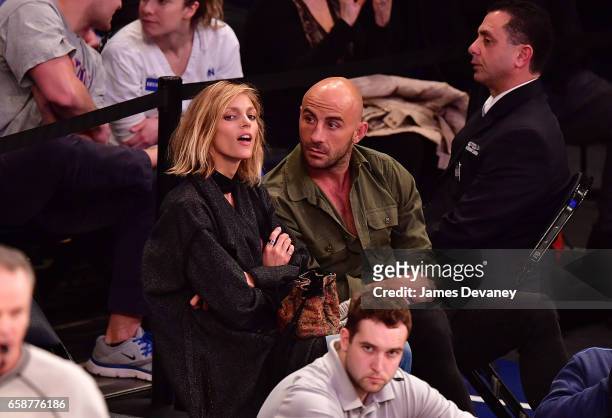 Anja Rubik and guest attend Detroit Pistons Vs. New York Knicks game at Madison Square Garden on March 27, 2017 in New York City.