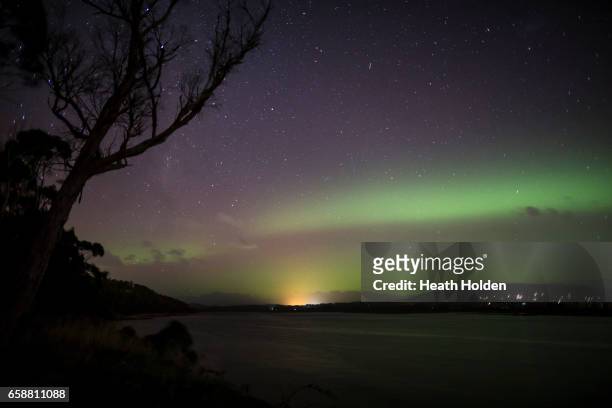 The Aurora Australis, or "Southern Lights" light up over the Mersey River in Devonport on March 27, 2017 in Devonport, Australia. Aurora Australis,...