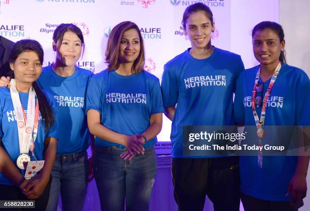 Saina Nehwal, Mary Kom, Heena Sidhu at a Felicitation function of BWF World Superseries 2017 in New Delhi.