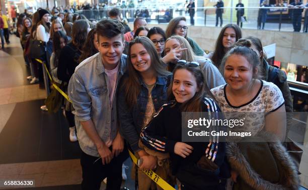 Yooczok' Lukasz Walas youtuber posing for pictures with fans during the opening of Forever 21 shop on March 25, 2017 at Zlote Tarasy in Warsaw,...