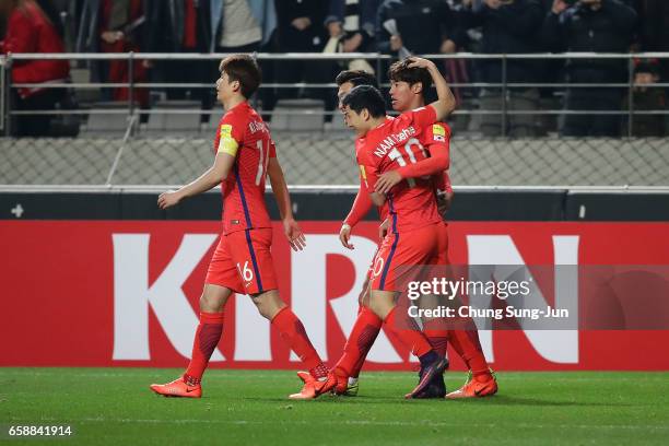 Hong Jeong-Ho of South Korea scores a goal during the FIFA World Cup Qualification AFC Final Group Stage match between South Korea and Syria at Seoul...