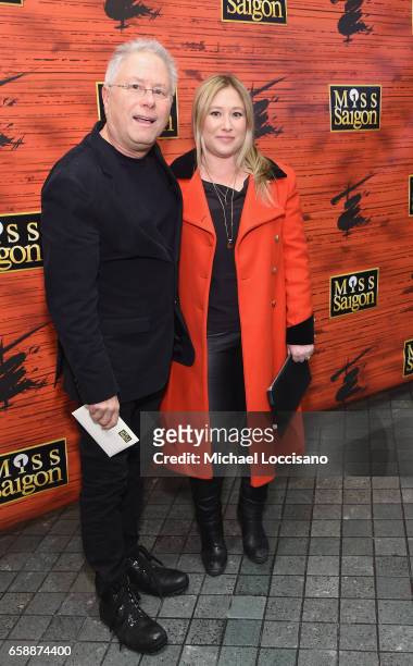 Film score composer Alan Menken and daughter, singer Anna Menken attend the opening night of "Miss Saigon" Broadway at the Broadway Theatre on March...
