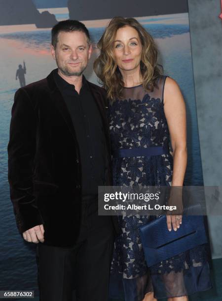 Actor Shea Whigham and wife Christine Whigham arrive for the Premiere Of Warner Bros. Pictures' "Kong: Skull Island" held at Dolby Theatre on March...