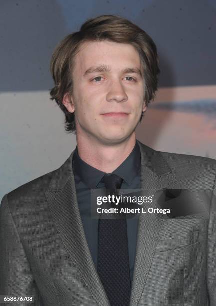 Actor Thomas Mann arrives for the Premiere Of Warner Bros. Pictures' "Kong: Skull Island" held at Dolby Theatre on March 8, 2017 in Hollywood,...