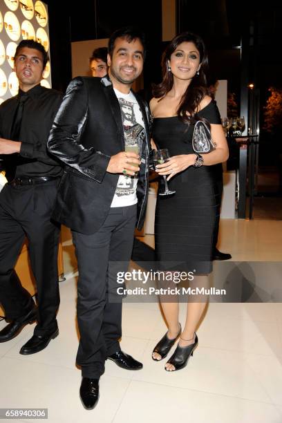 Raj Kundra and Shilpa Shetty attend LOUIS VUITTON and DETAILS with LL COOL J host Cocktails in Support of Heroes at Home at Louis Vuitton on August...