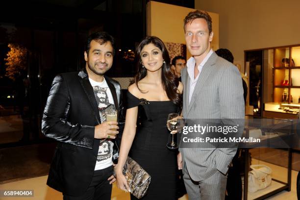 Raj Kundra, Shilpa Shetty and Geoffroy van Raemdonck attend LOUIS VUITTON and DETAILS with LL COOL J host Cocktails in Support of Heroes at Home at...