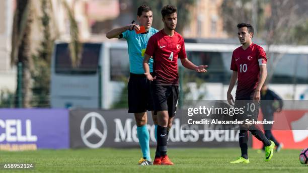 Abdussamed Karnucu of Turkey gets the redc cart during the UEFA U17 elite round match between Germany and Turkey on March 28, 2017 in Manavgat,...