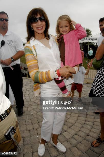 Sale Johnson and Ava Monroe attend 34th Annual HAMPTON CLASSIC Horse Show at The Grand Prix Tent on August 30, 2009 in Bridgehampton, NY.