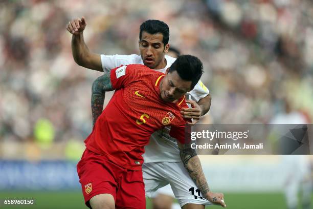 Vahid Amiri of Iran and Zhang Linpeng of china in action during Iran against China PR - FIFA 2018 World Cup Qualifier on March 28, 2017 in Tehran,...