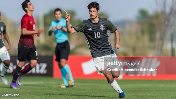 Elias Abouchabaka of Germany celebrates the third goal for his team with his teammates during the UEFA U17 elite round match between Germany and...