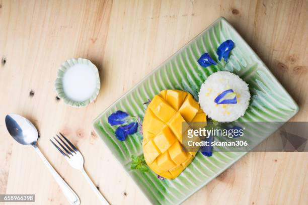 sweet and thailand dessert mango and sticky rice - mango stock pictures, royalty-free photos & images