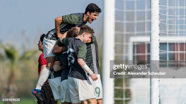 Jann-Fiete Arp of Germany celebrates the second goal for his team with his teammates during the UEFA U17 elite round match between Germany and Turkey...