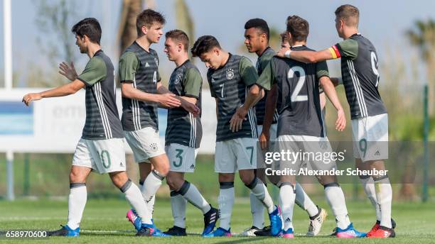 Jann-Fiete Arp of Germany celebrates the second goal for his team with his teammates during the UEFA U17 elite round match between Germany and Turkey...