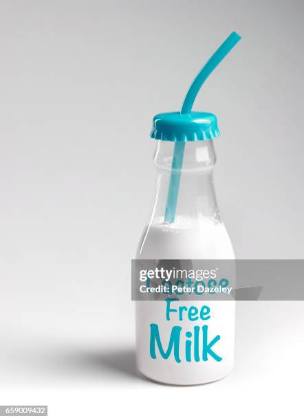 lactose free milk with copy space - lactose intolerance stock pictures, royalty-free photos & images