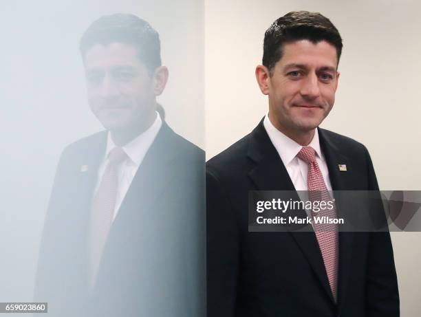 House Speaker Paul Ryan walks into a media briefing after attending a closed House Republican conference, on Capitol Hill, on March 28, 2017 in...