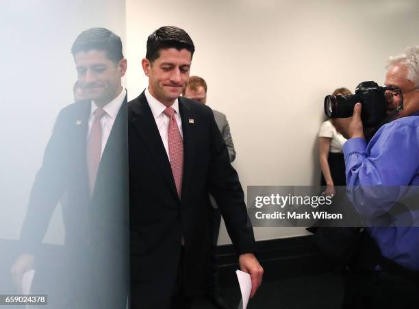 House Speaker Paul Ryan walks into a media briefing after attending a closed House Republican conference, on Capitol Hill, on March 28, 2017 in...