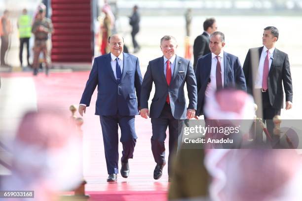 Yemeni President Abdrabbuh Mansur Hadi is welcomed by Jordanian King Abdullah II bin Al-Hussein with an official ceremony at Queen Alia International...